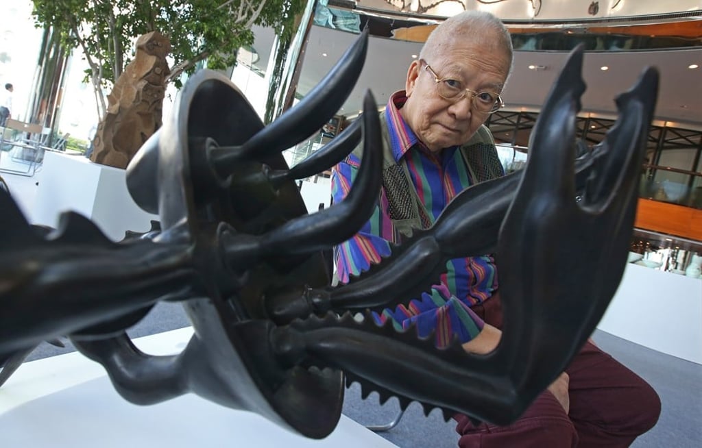 Cheung Yee and his artwork Crab #4 at the Reunion exhibition at Exchange Square in Central. Photo: David Wong