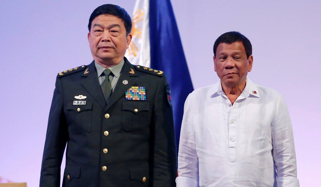 Chinese Defence Minister Chang Wanquan (left) and Philippine President Rodrigo Duterte at the Asean defence ministers' meeting at Clark, north of Manila, on Tuesday. October 24, 2017 Photo: Reuters