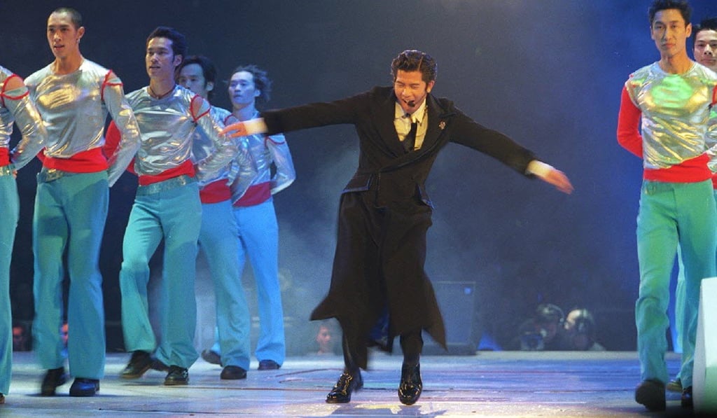 Singer Aaron Kwok dances during a pop concert at Hong Kong Coliseum in 1998. Photo: May Tse