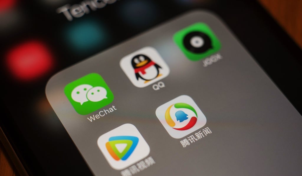 The icons for Tencent Holdings Ltd applications WeChat, clockwise from top left, QQ, JOOX, Tencent News and Tencent Video are arranged on an Apple iPhone. Photo: Bloomberg