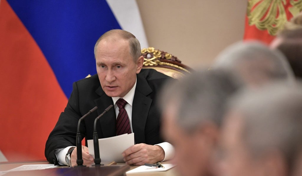 Russian President Vladimir Putin chairs a meeting of the Security Council at the Kremlin on October 26, 2017. Photo: Reuters
