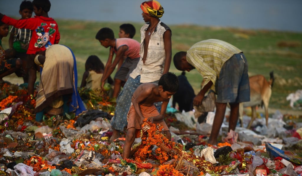 Indians search for reusable materials on the bank of the Ganges river in Allahabad. Photo: AFP Indians search for reusable materials on the bank of the Ganges river in Allahabad. Photo: AFP