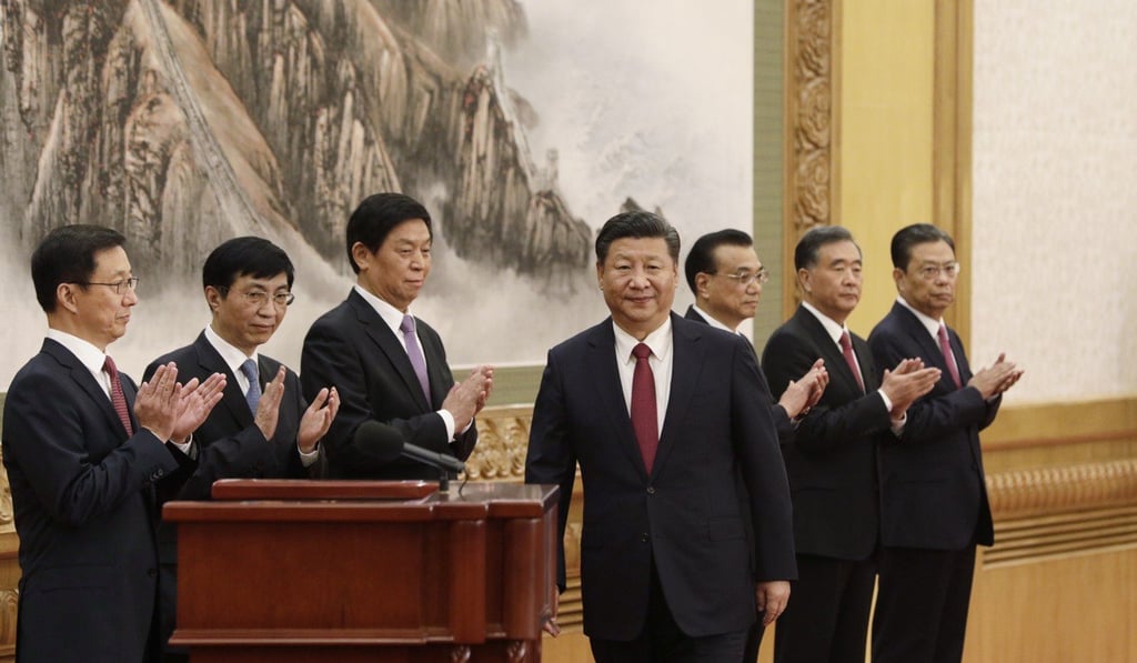 Xi Jinping (centre) with other members of the new Politburo Standing Committee (from left) Han Zheng, Wang Huning, Li Zhanshu, Li Keqiang, Wang Yang and Zhao Leji in Beijing on Wednesday. Photo: Bloomberg Xi Jinping (centre) with other members of the new Politburo Standing Committee (from left) Han Zheng, Wang Huning, Li Zhanshu, Li Keqiang, Wang Yang and Zhao Leji in Beijing on Wednesday. Photo: Bloomberg