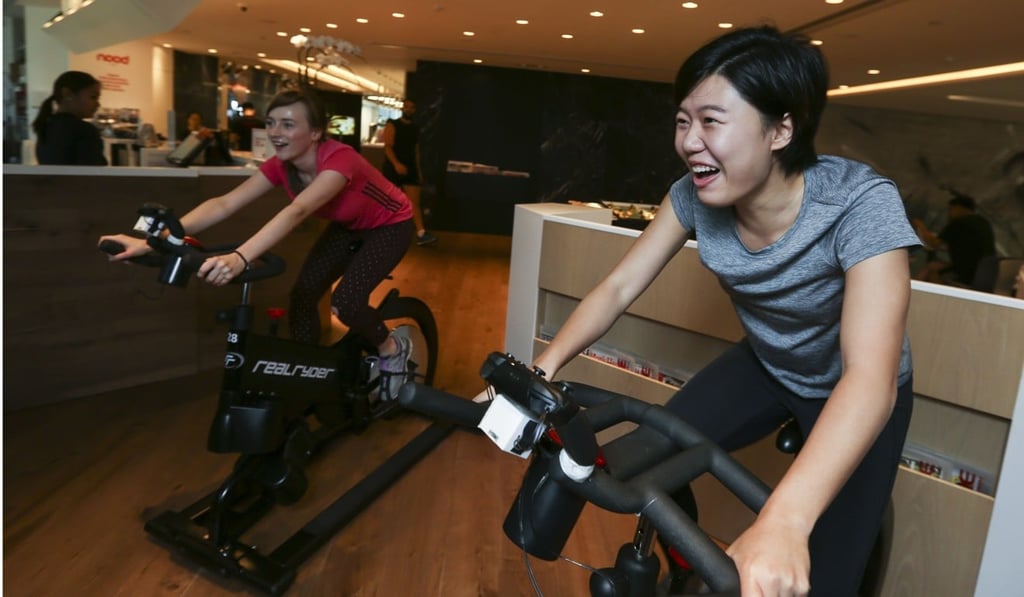 Although the pedalling does not affect the speed in the game, users instinctively pedal faster when they approach jumps or to catch their rival. Photo: Xiaomei Chen
