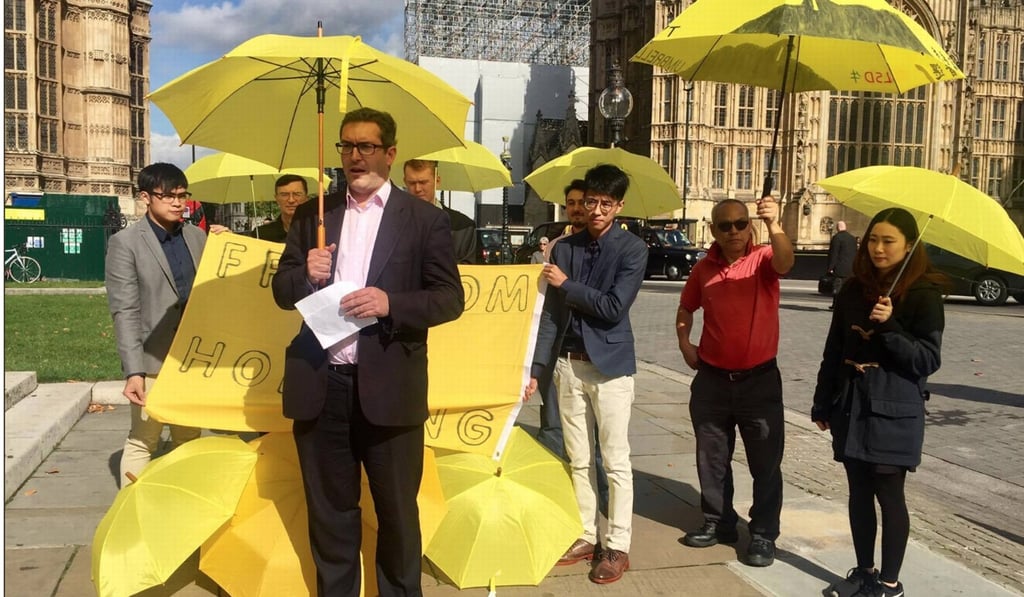 Benedict Rogers (front) speaks at a demonstration for Hong Kong democracy outside Parliament House in London. Photo: Twitter/Benedict Rogers