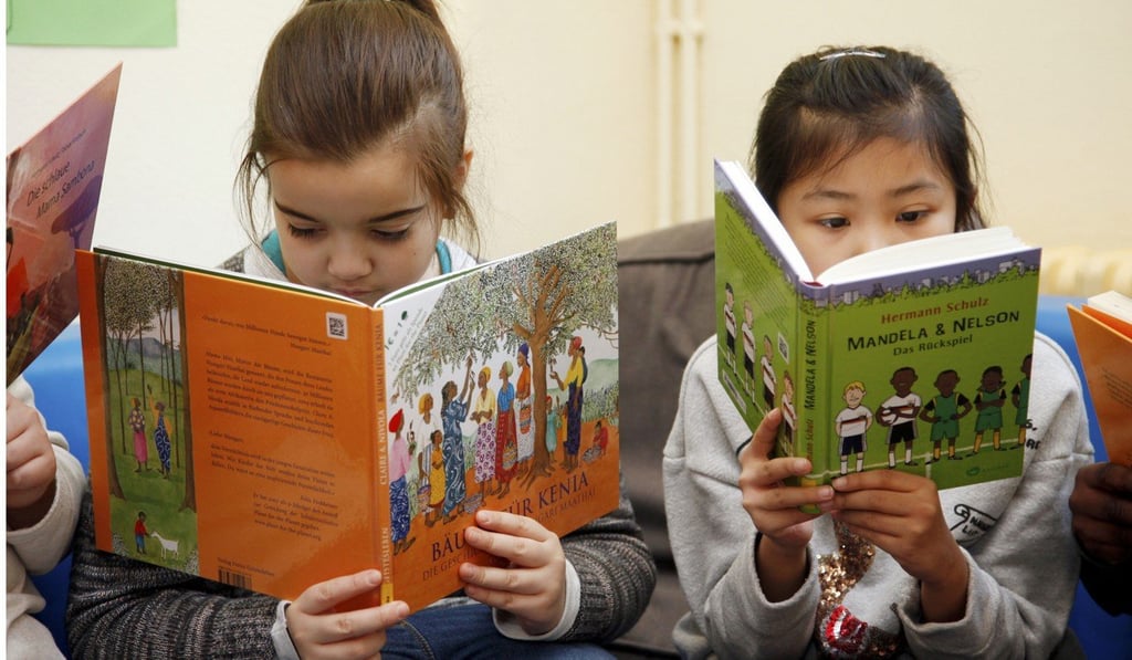 There is pressure on Hong Kong children and adults to learn more than one language. Photo: Alamy