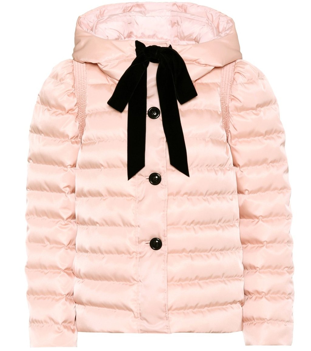 Pale pink jacket with ribbon by Miu Miu. Pale pink jacket with ribbon by Miu Miu.