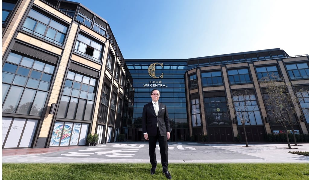 Raymond Chow, executive director of WF Central, outside the new shopping centre in Beijing. Photo: SCMP