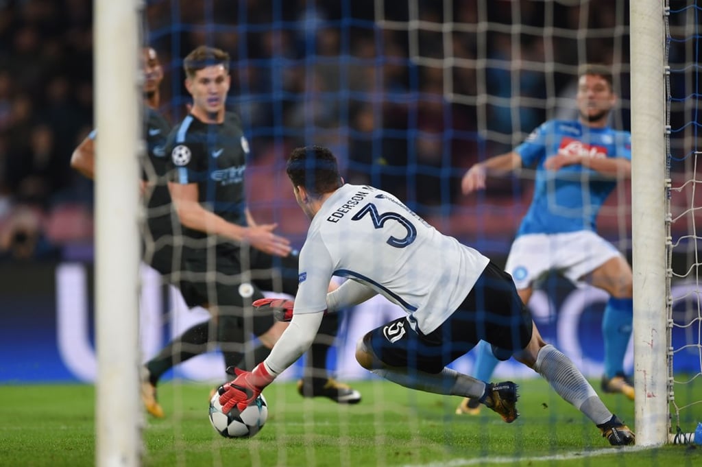 Manchester City goalkeeper Ederson makes a save during the UEFA Champions League win over Napoli. Photo: AFP