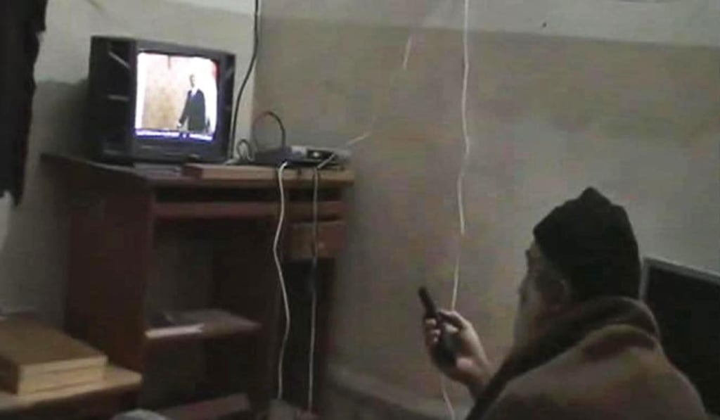 An undated image from video, seized from the walled compound of al-Qaeda leader Osama bin Laden in Abbottabad, Pakistan, and released by the US Department of Defence shows Bin Laden, watching President Barack Obama on his television. Photo: AP