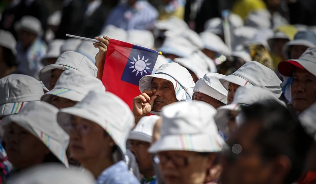Taiwanese listen to President Tsai Ing-wen (unseen) as she speaks during the Taiwan National Day celebrations in Taipei, on October 10. For China, the status of Taiwan is considered a “core national interest”. Photo: EPA-EFE