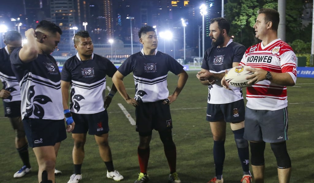 Hong Kong coach Jason Fairleigh addresses his charges at training ahead of their test against Japan. Photo: David Wong