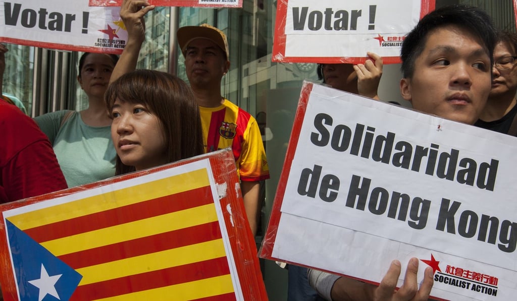 Pro-Catalonia independence activists gather in front of the Hong Kong offices of FC Barcelona on October 8, to show solidarity with the Catalan general strike by students and workers in support of self-determination. Photo: EPA-EFE