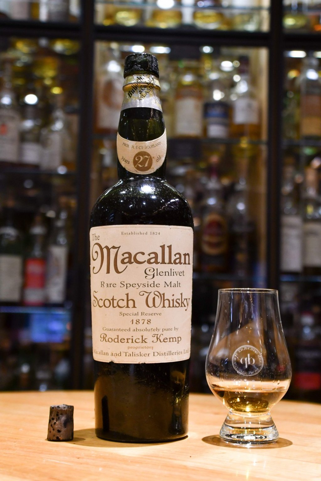 This file photo released by the Waldhaus hotel in St Moritz shows a bottle of Macallan whisky labelled 1878 at the hotel's Devil's Place Whisky Bar. Photo: Agence France-Presse