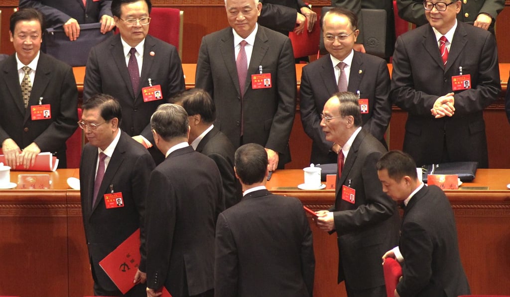 Wang Qishan, front row, second from right, stepped down from his role on the Politburo Standing Committee. Photo SCMP
