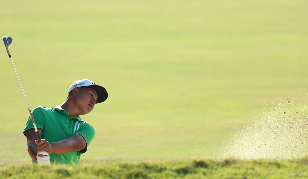 Lin Yuxin negotiates his way out of a bunker at Clearwater Bay.