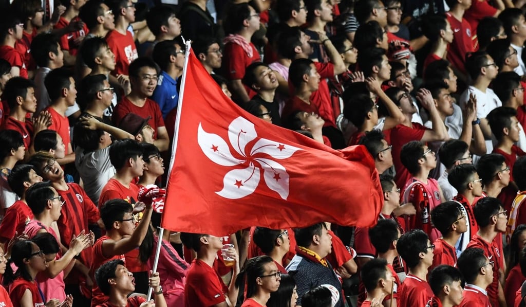 A Hong Kong flag held during a sporting event. The new law punishes disrespect for China's national anthem with up to three years' imprisonment. Photo: AFP