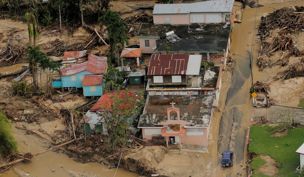 Damage left by a flooded river is seen from the air during recovery efforts following Hurricane Maria near Utuado, Puerto Rico. Photo: Reuters