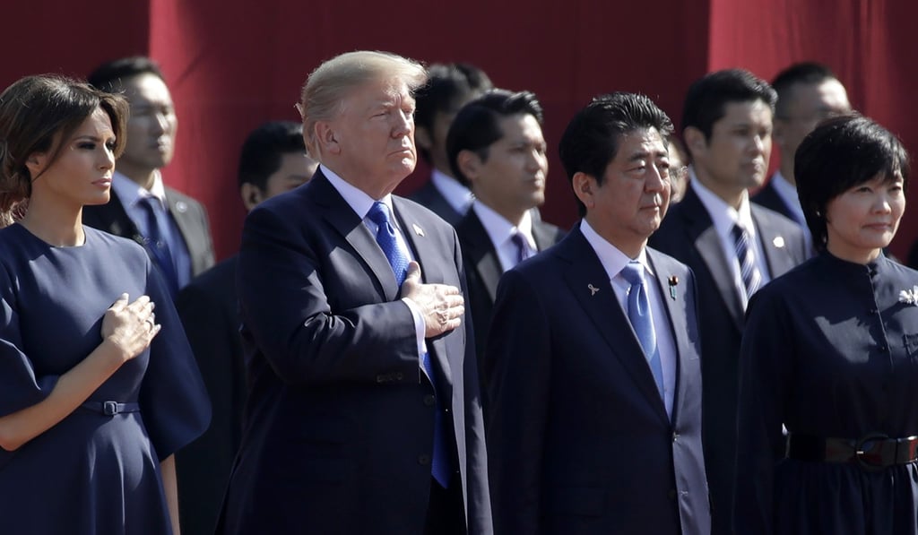 Melania Trump, US President Donald Trump, Japanese Prime Minister Shinzo Abe and Akie Abe attend a welcome ceremony at Akasaka State Guest House in Tokyo on Monday. Photo: AFP