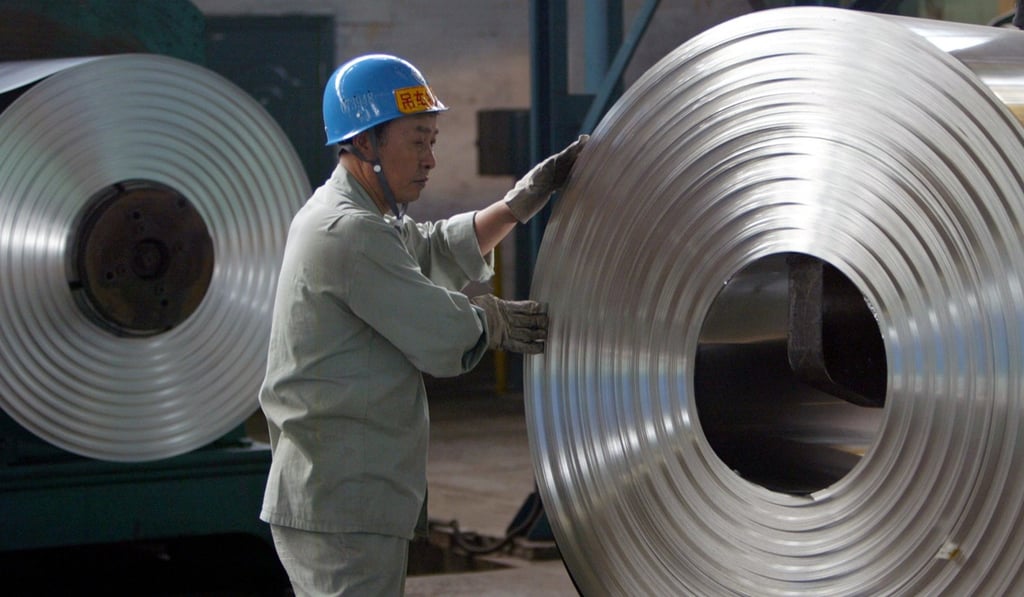 A labourer works at a cold-rolling mill on the outskirts of Wuhan, capital of central China's Hubei province. Photo: Reuters