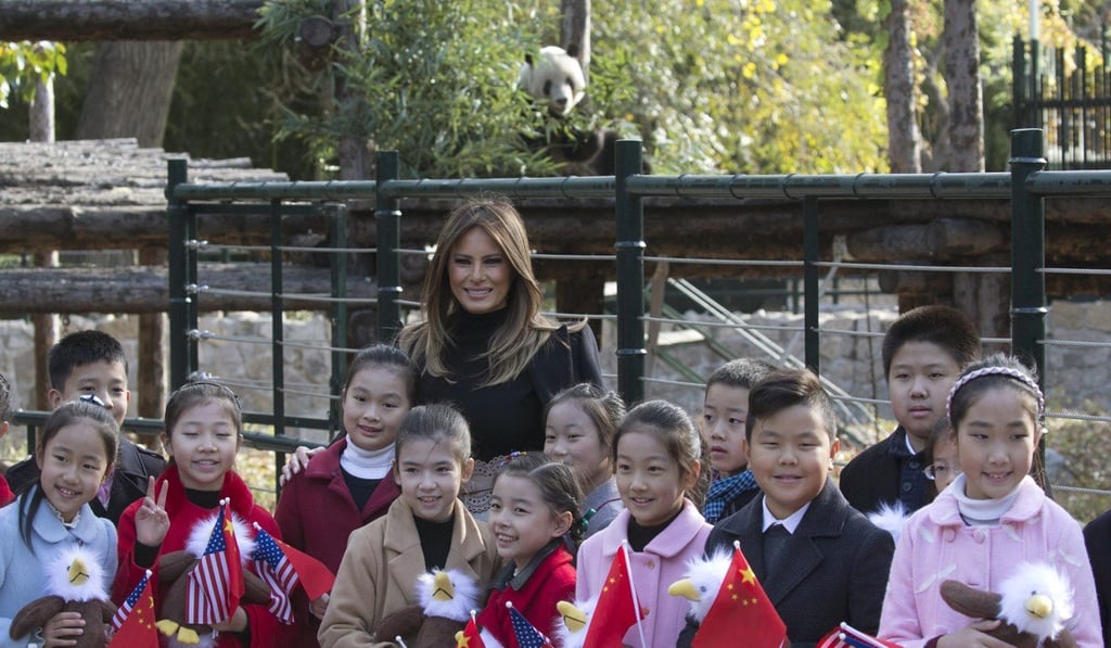 Schoolchildren welcome Melania Trump to the Beijing Zoo on Friday. Photo: AP Schoolchildren welcome Melania Trump to the Beijing Zoo on Friday. Photo: AP