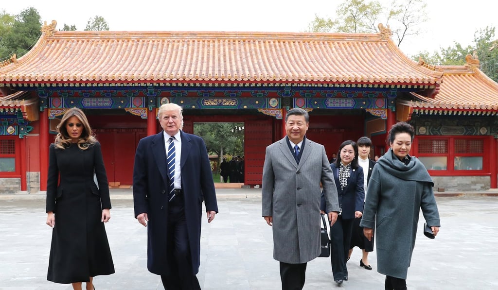 US President Donald J. Trump (2-L), first lady Melania Trump (L), Chinese President Xi Jinping (2-R) and his wife Peng Liyuan at the Palace Museum, or the Forbidden City in Beijing, China, 08 November 2017. Photo: Xinhua US President Donald J. Trump (2-L), first lady Melania Trump (L), Chinese President Xi Jinping (2-R) and his wife Peng Liyuan at the Palace Museum, or the Forbidden City in Beijing, China, 08 November 2017. Photo: Xinhua