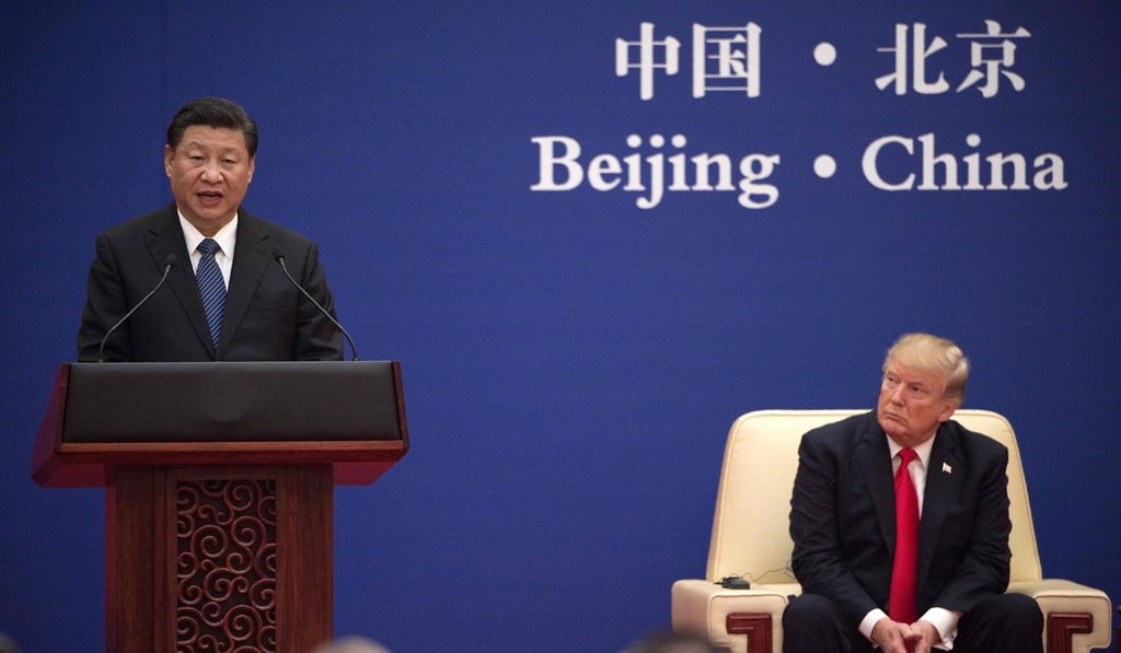 China's President Xi Jinping (L) speaks next to US President Donald Trump during a business leaders event at the Great Hall of the People in Beijing on November 9, 2017. Photo: Agence France-Presse China's President Xi Jinping (L) speaks next to US President Donald Trump during a business leaders event at the Great Hall of the People in Beijing on November 9, 2017. Photo: Agence France-Presse