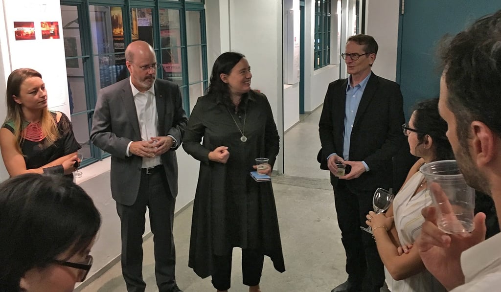 Greg Girard (back right) has exhibited his work at galleries from New York to South Korea. Photo: Handout