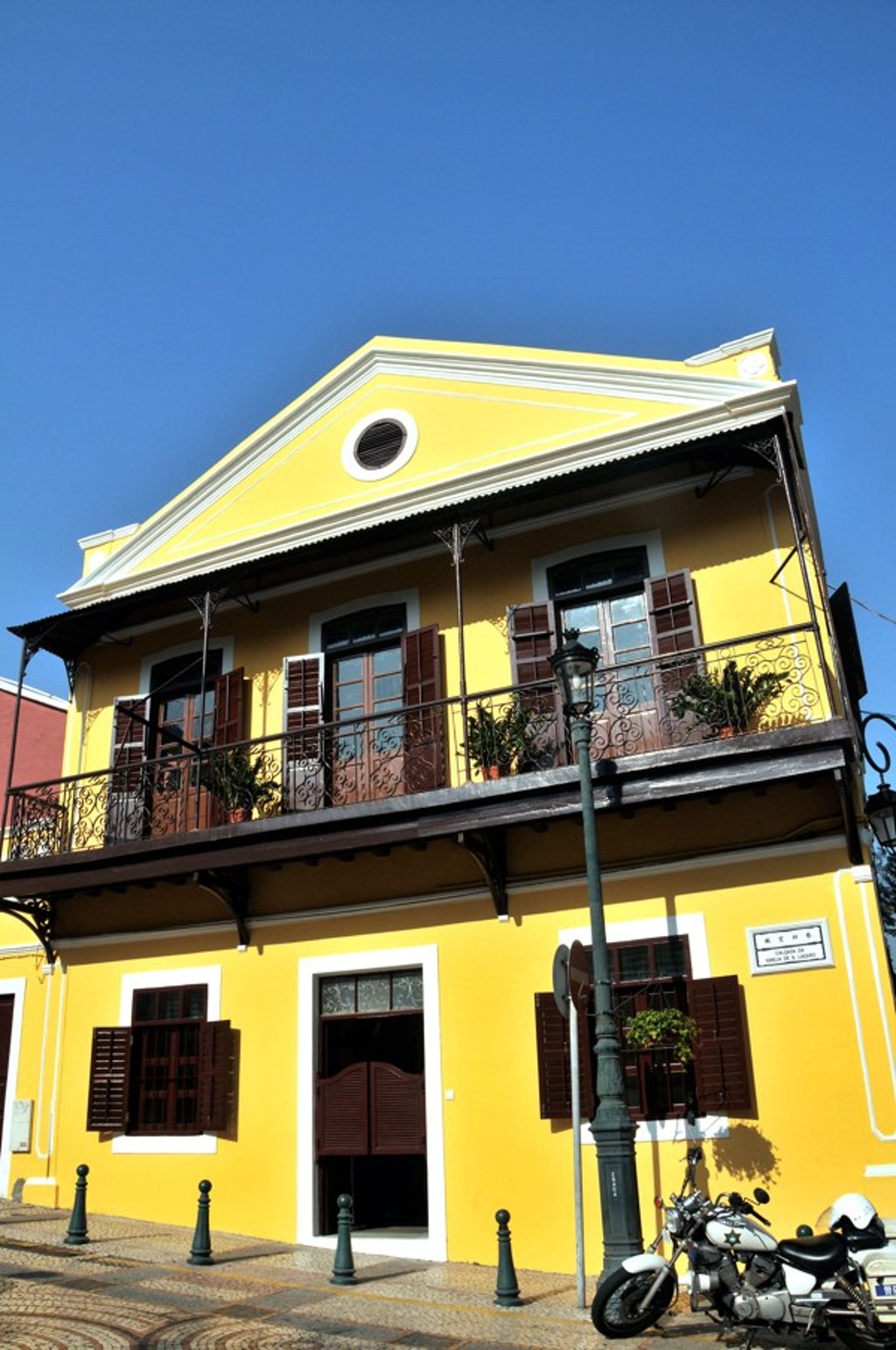 The distinctive yellow seen on many Macau houses was due to sulphur being added to whitewash, to repel insects and inhibit mould growth. Picture: Alamy