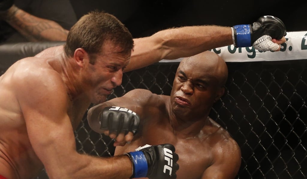 Anderson Silva (right) is provisionally suspended following another failed drug test. Photo: AP