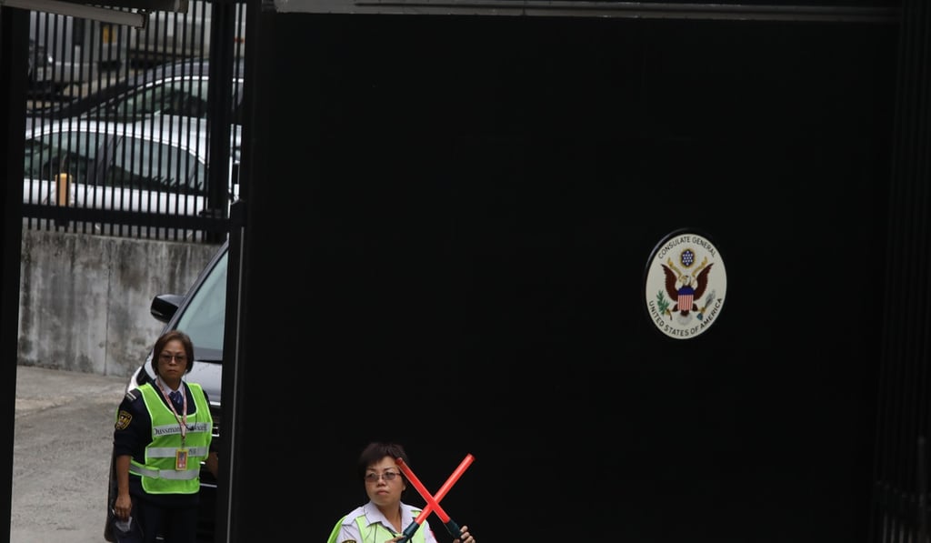 Security guards at the entrance of the consulate. Photo: Sam Tsang