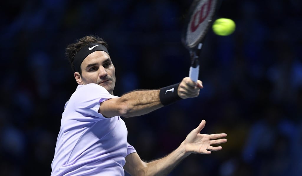 Roger Federer hits a forehand against Jack Sock. Photo: EPA Roger Federer hits a forehand against Jack Sock. Photo: EPA
