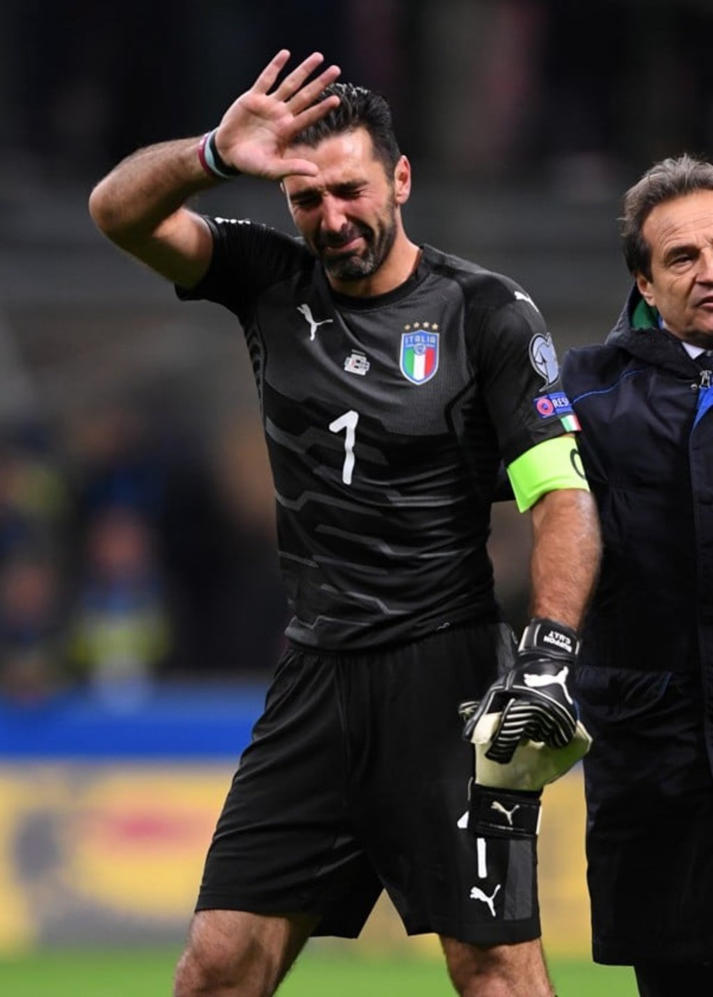 Italian great Gianluigi Buffon in tears as he leaves the pitch following his final game for Italy. Photo: Xinhua