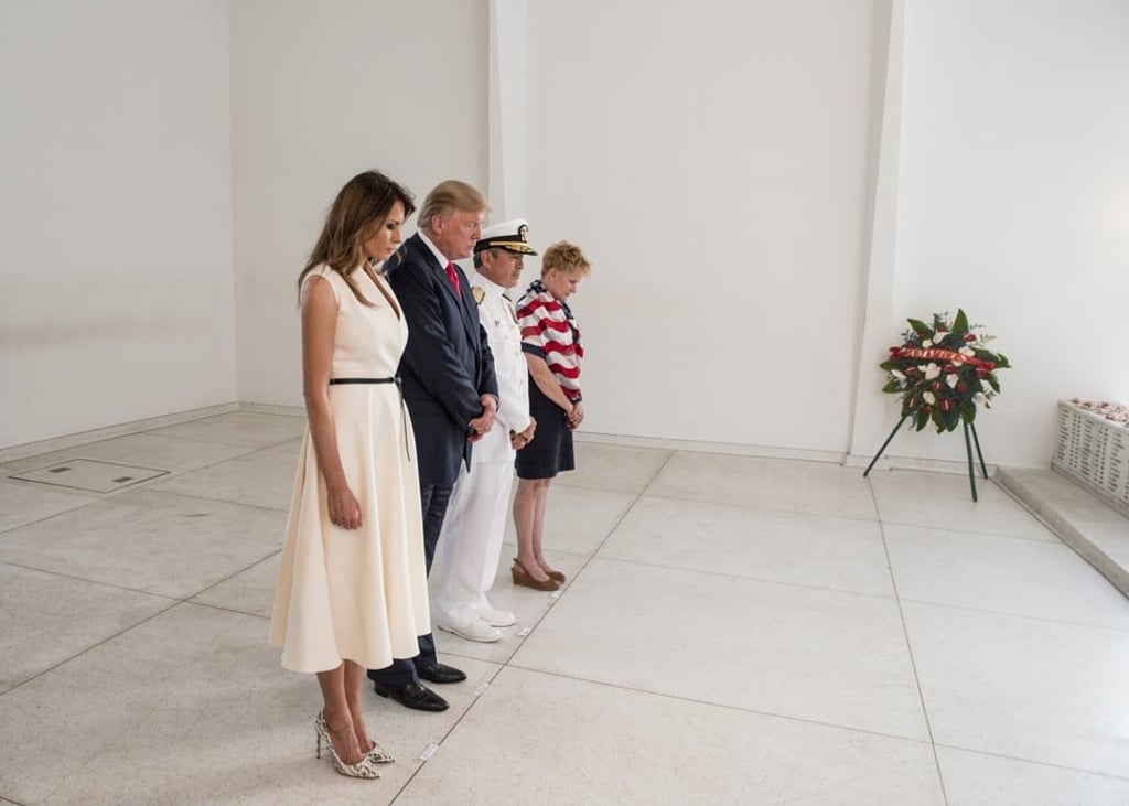 (From left) Melania Trump, Donald Trump, Admiral Harry Harris and Harris’ wife Bruni Bradley honour fallen service members at the USS Arizona Memorial at Pearl Harbour. Photo: EPE-EFE