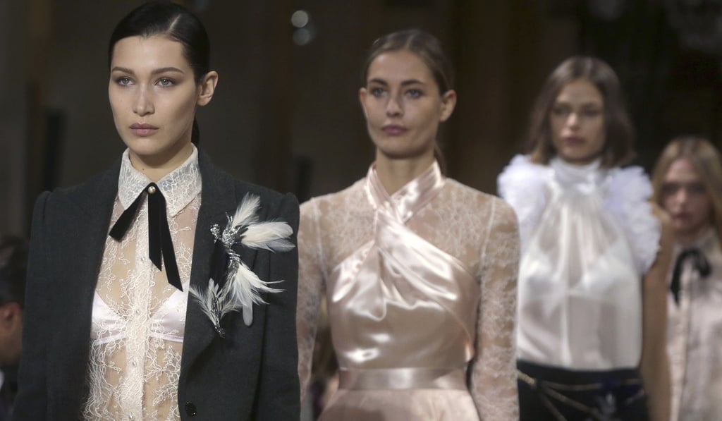 Model Bella Hadid (left) wears a creation for Lanvin's autumn-winter 2017-2018 ready-to-wear fashion collection in Paris, in March. Photo: AP