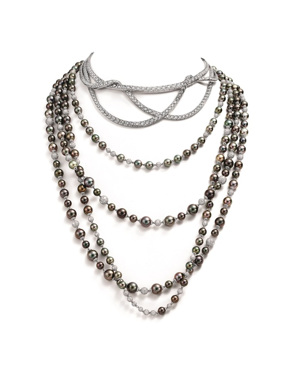 Necklaces in platinum with cultured Tahitian pearls and diamonds of ‘adjustable’ layers. Necklaces in platinum with cultured Tahitian pearls and diamonds of ‘adjustable’ layers.