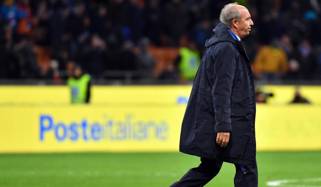 Italy's head coach Gian Piero Ventura leaves the pitch in disappointment after their aggregate loss to Sweden. Photo: EPA