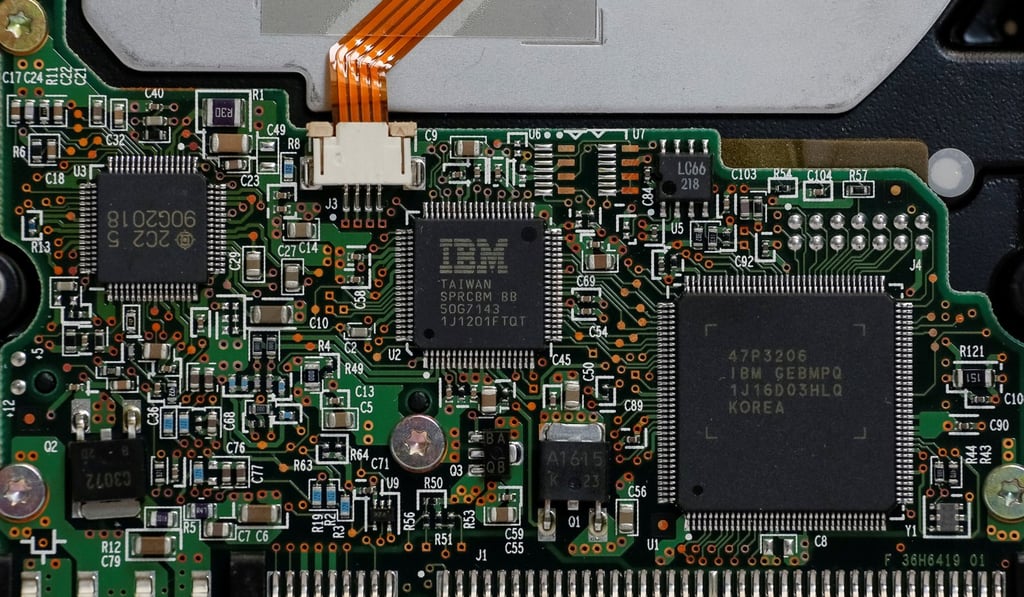 IBM chips are seen. Billionaire stock picker Warren Buffett is cutting his stake in IBM. Photo: Reuters