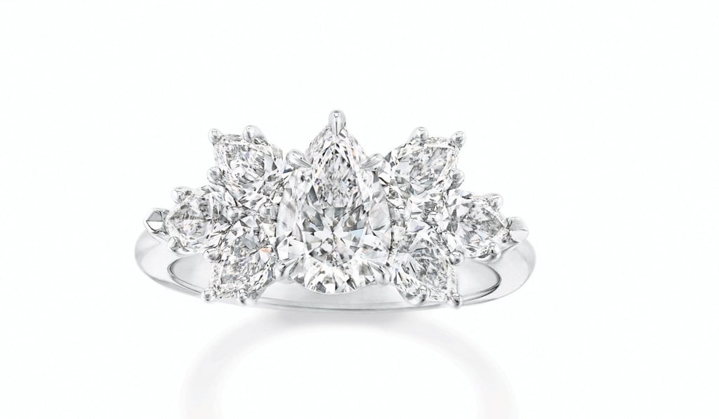 Harry Winston pear-shaped platinum Cluster diamond ring. Harry Winston pear-shaped platinum Cluster diamond ring.