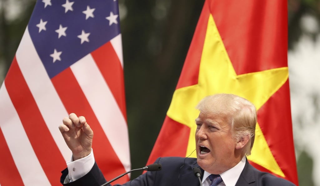 US President Donald Trump speaks on Sunday during his visit to Vietnam. Photo: AP