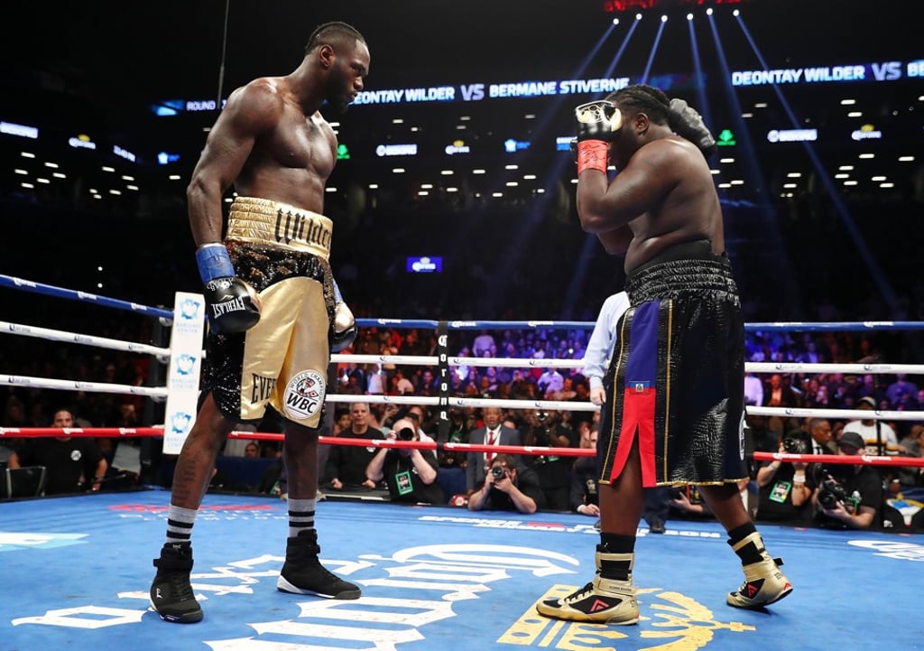 Wilder stares down Bermane Stiverne after knocking him down in his most recent fight. Photo: AFP