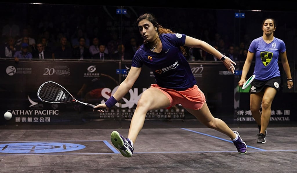 Nour El Sherbini reaches for a shot against compatriot Raneem El Welily in the women’s final. Nour El Sherbini reaches for a shot against compatriot Raneem El Welily in the women’s final.