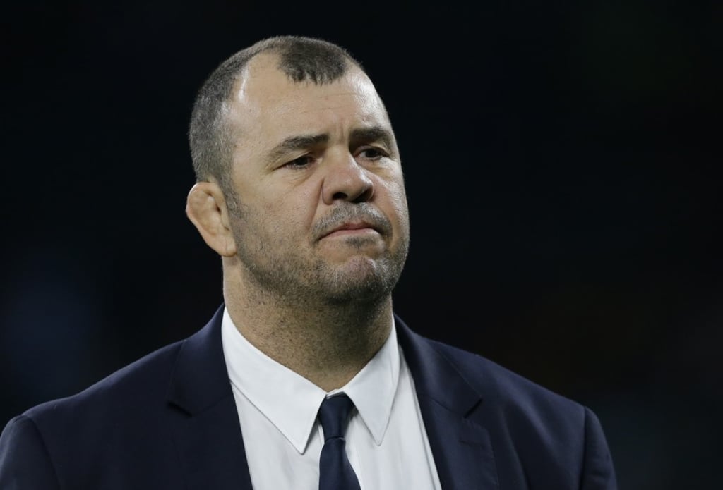 Australia’s head coach Michael Cheika was caught on camera calling someone ‘cheats’. Photo: AP
