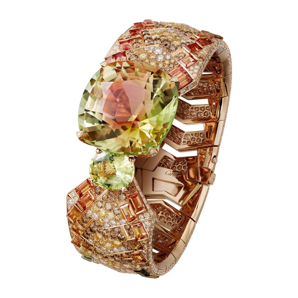 A pink gold Cartier bracelet, which features a one 84.10ct cushion-shaped watermelon tourmaline, one 8.01ct cushion-shaped yellow green sapphire, baguette-cut coloured sapphires and brown, light orange and white brilliant-cut diamonds. Photo: Cartier A pink gold Cartier bracelet, which features a one 84.10ct cushion-shaped watermelon tourmaline, one 8.01ct cushion-shaped yellow green sapphire, baguette-cut coloured sapphires and brown, light orange and white brilliant-cut diamonds. Photo: Cartier