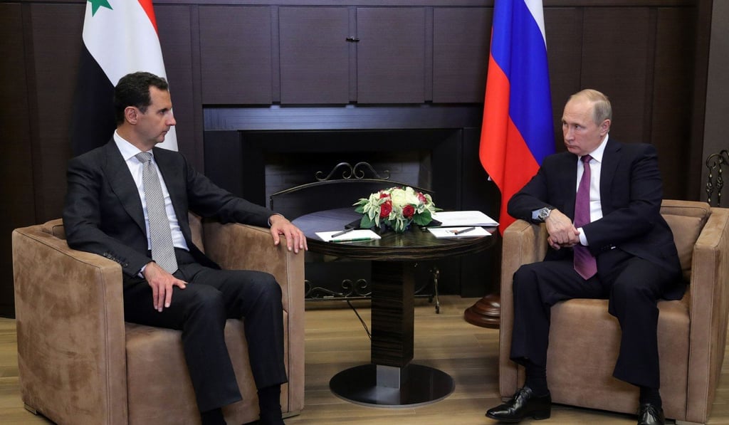 Assad and Putin at their meeting. Photo: AFP