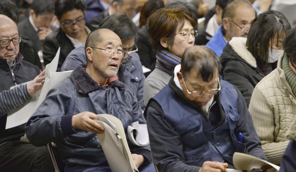 Fish market officials attend a meeting of a panel of experts formed by the Tokyo metropolitan government to deal with soil contamination at the new Toyosu wholesale market site in January. Officials said that benzene at 79 times the government-set allowable limit had been detected, along with other toxic chemicals, in groundwater samples from the Toyosu site. Photo: Kyodo
