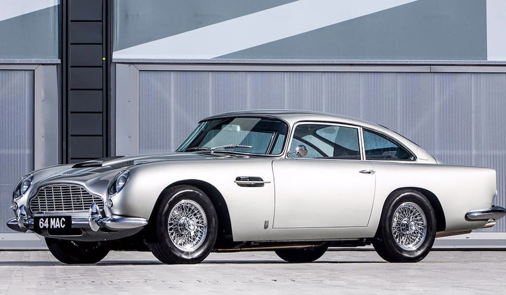 The Aston Martin DB5 that is coming up for auction is the same model driven by James Bond in the film Goldfinger. The Aston Martin DB5 that is coming up for auction is the same model driven by James Bond in the film Goldfinger.