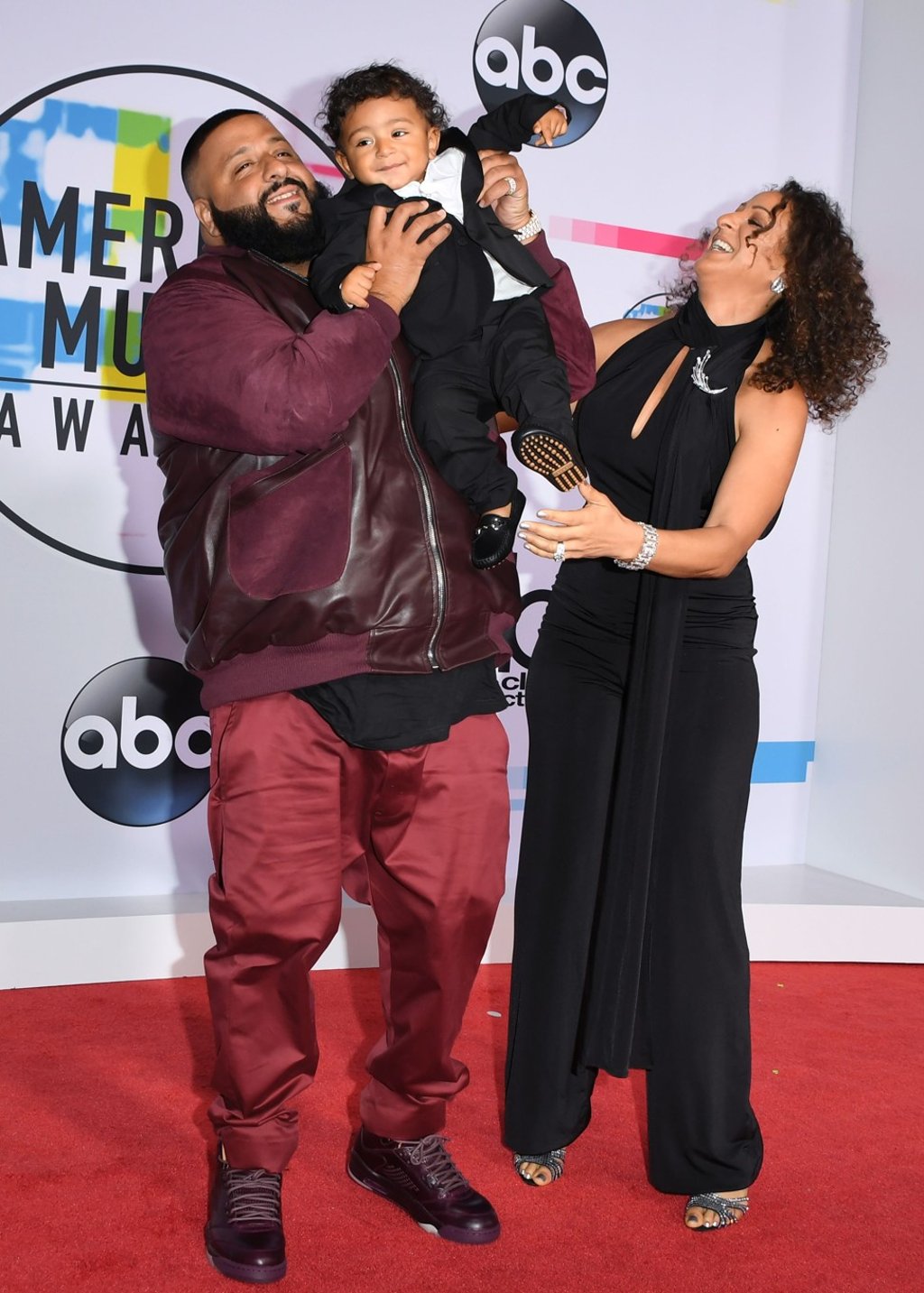 DJ Khaled (left), Asahd Tuck Khaled (centre) and Nicole Tuck arrive at the 2017 American Music Awards on Sunday. Photo: AFP DJ Khaled (left), Asahd Tuck Khaled (centre) and Nicole Tuck arrive at the 2017 American Music Awards on Sunday. Photo: AFP