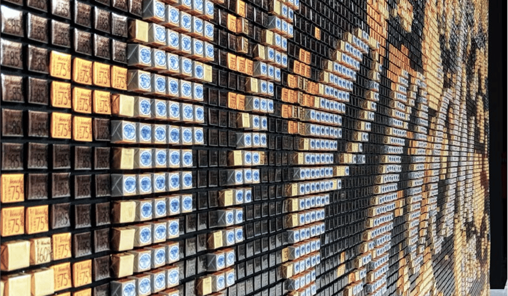 Visitors to Bologna’s Fico Eataly World are free to pick the chocolates off the building’s exterior walls, which measure three metres long and six metres tall. Visitors to Bologna’s Fico Eataly World are free to pick the chocolates off the building’s exterior walls, which measure three metres long and six metres tall.