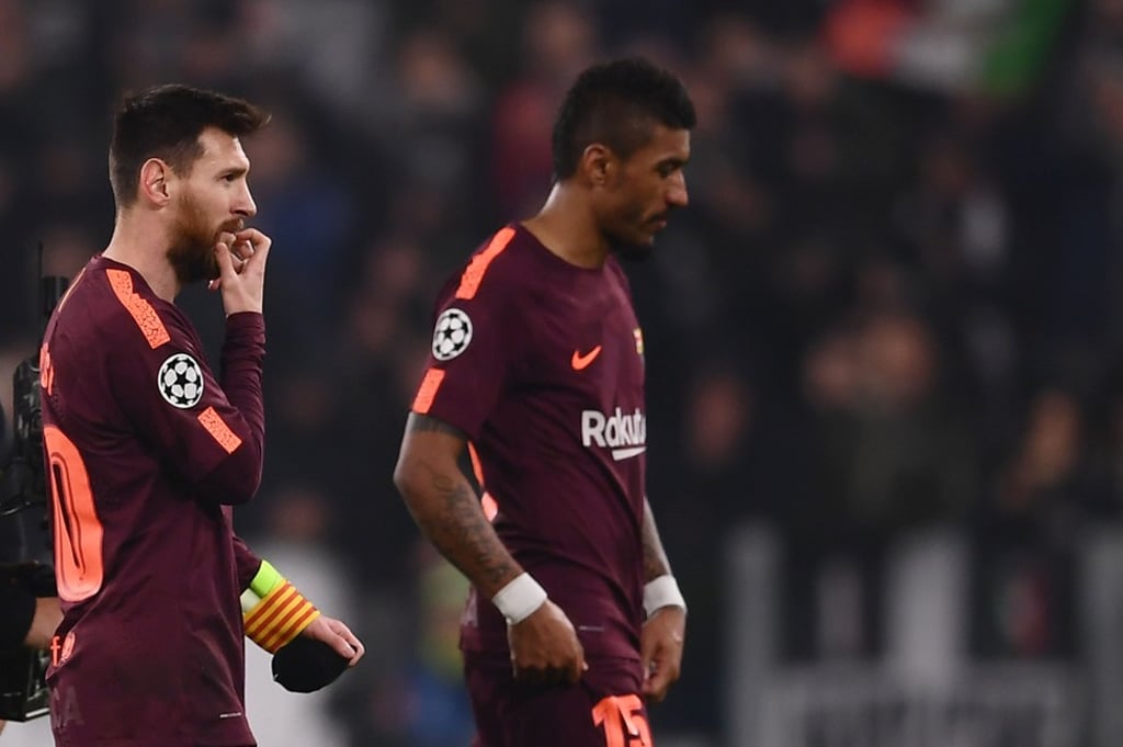 Barcelona’s Lionel Messi (L) and Paulinho leave the pitch at the end of the stalemate with Juventus. Photo: AFP
